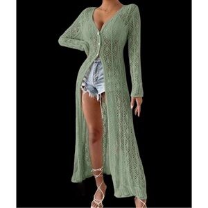 Solid Color Knitted Button
Front Long Cardigan With Hollow Out Detail
